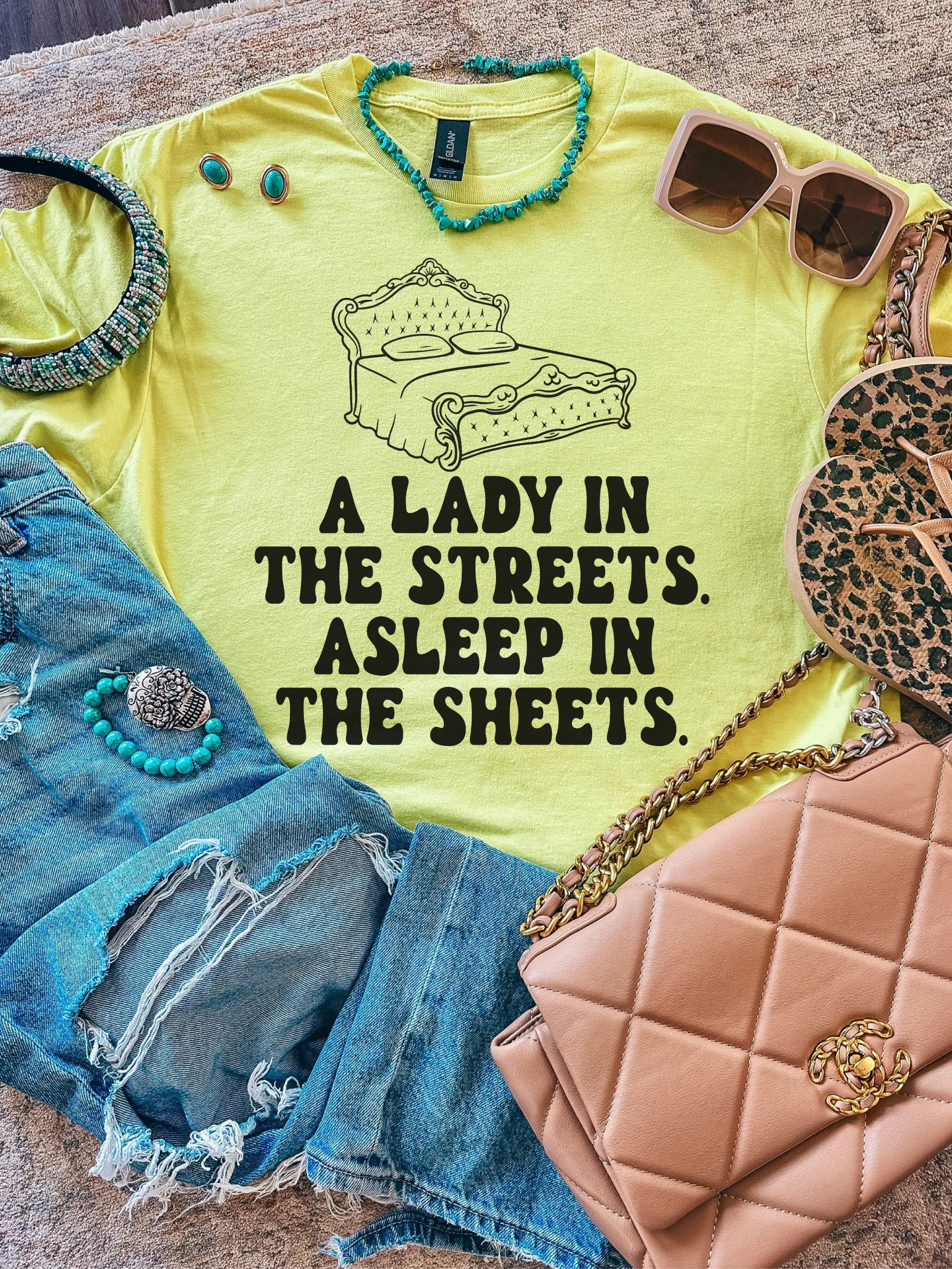 A Lady In The Streets. Asleep In The Sheets.