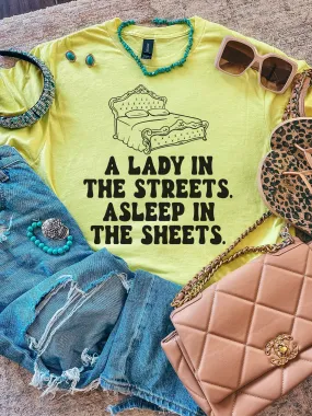 A Lady In The Streets. Asleep In The Sheets.