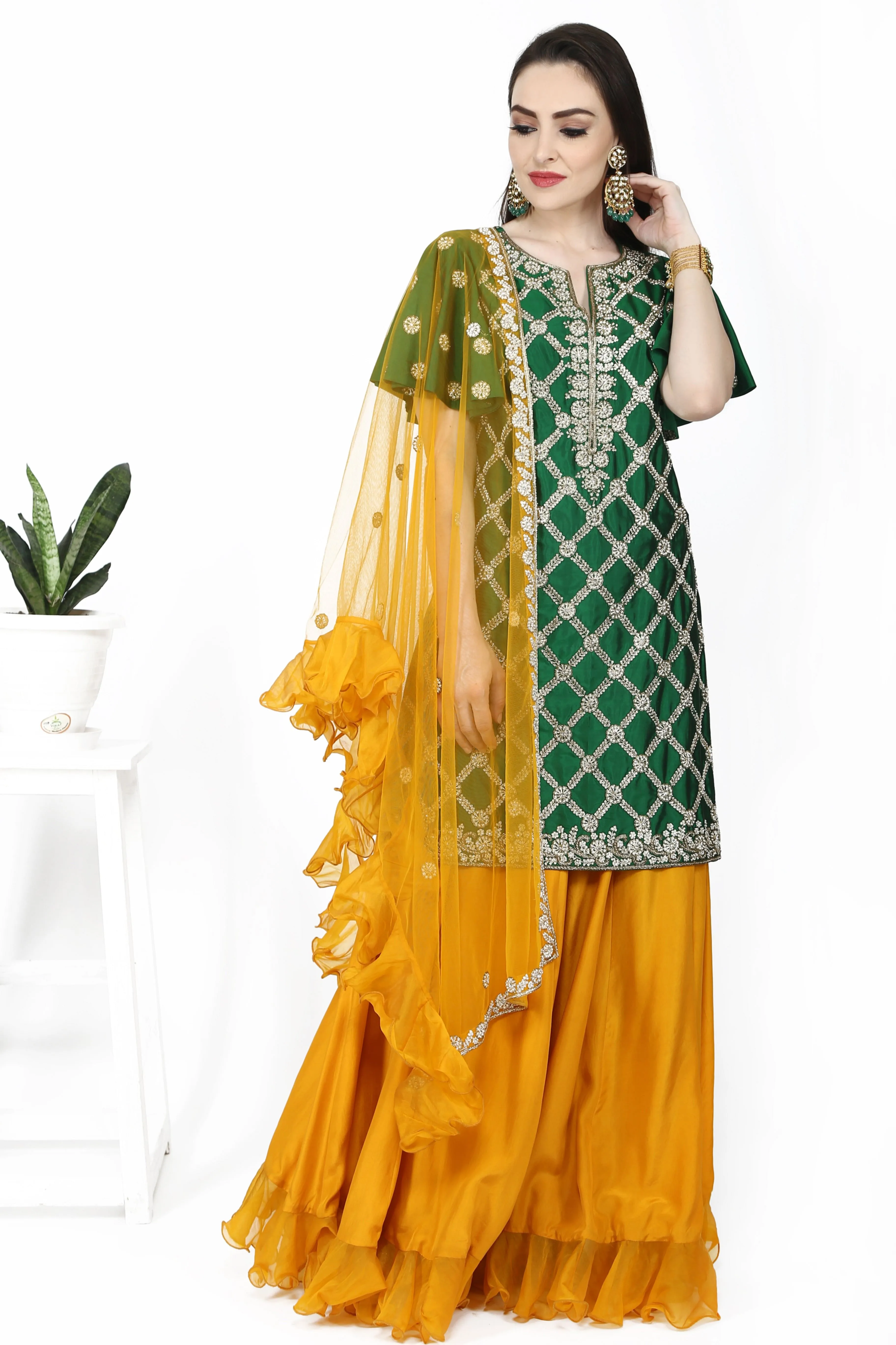 Emerald green tunic and mustard yellow flare sharara.