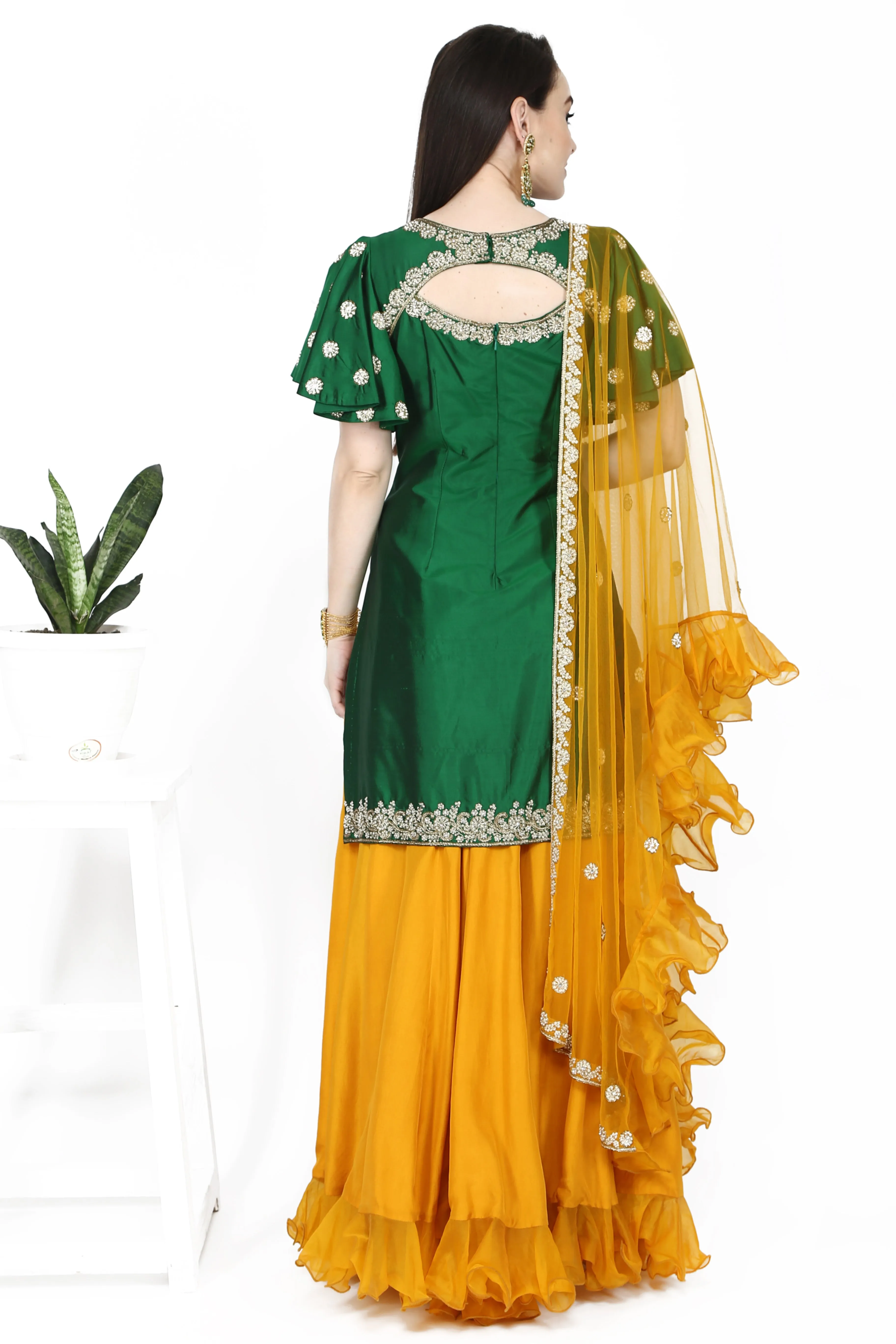 Emerald green tunic and mustard yellow flare sharara.